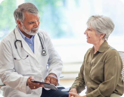 A doctor talking to a patient.