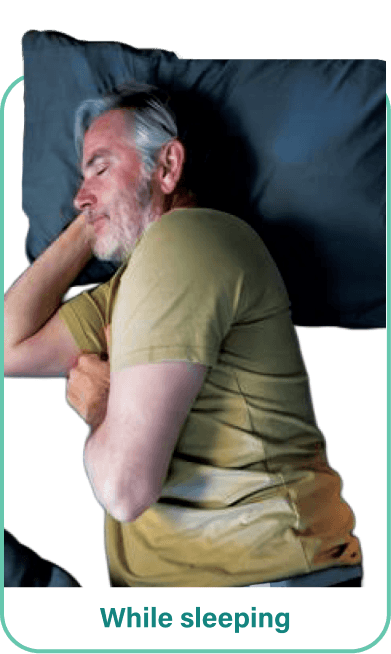 A man sleeping with his VYALEV® (foscarbidopa/foslevodopa) pump next to him.