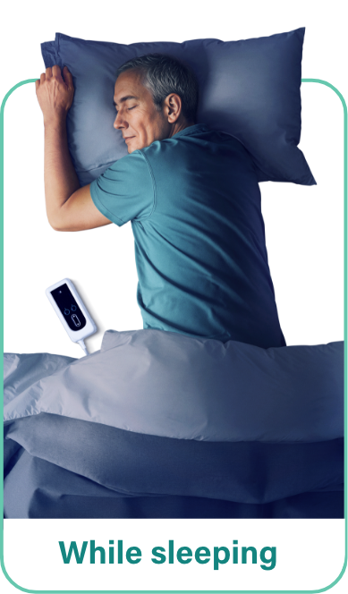 A man sleeping with his VYALEV pump next to him.